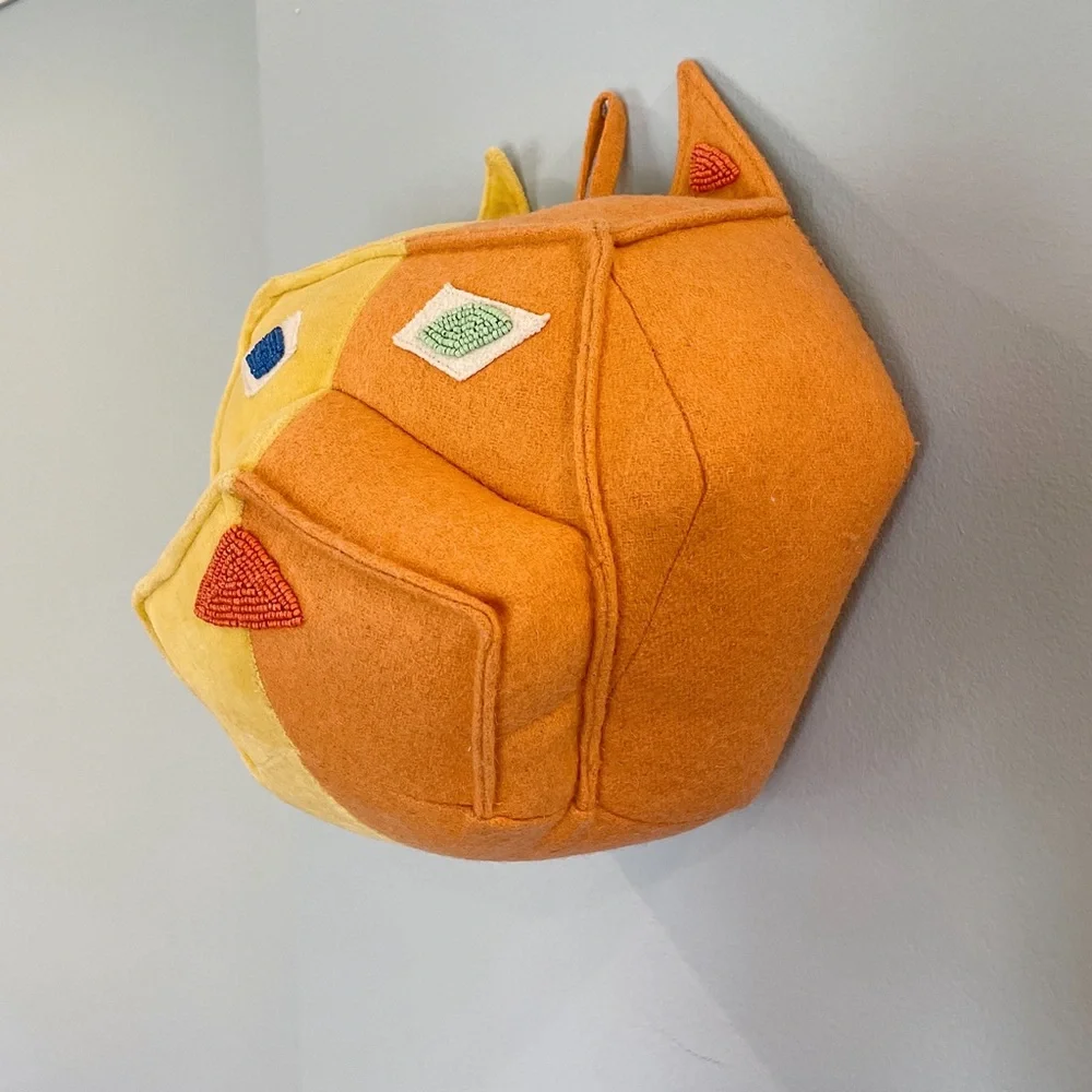 Domino x Crate & Barrel colorful dog head wall decor